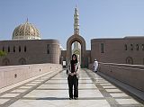Muscat 04 Grand Mosque 03 Entrance With Female Dress Code Women visiting the mosque have to cover almost everything from their hair and neck to shoulders, arms and legs. Here is Charlotte in her official dress code to enter Muscat�s Grand Mosque.